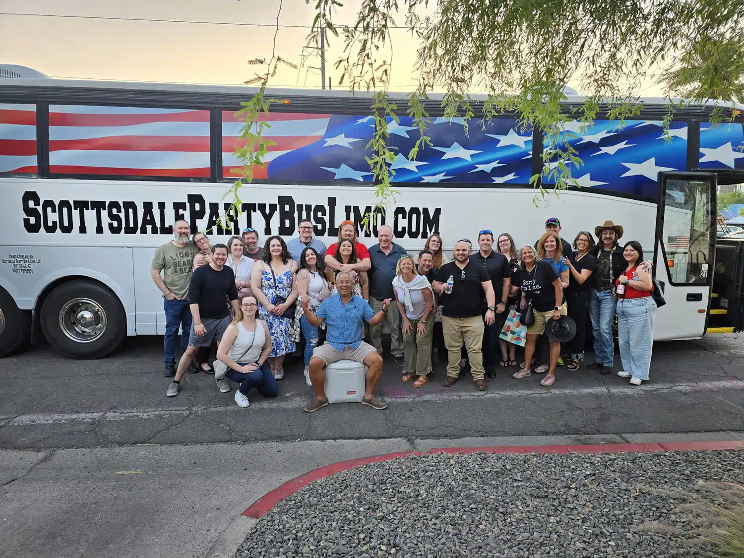 party-bus-for-corporate-parties team building event in front of corporate party bus rental in Scottsdale AZ